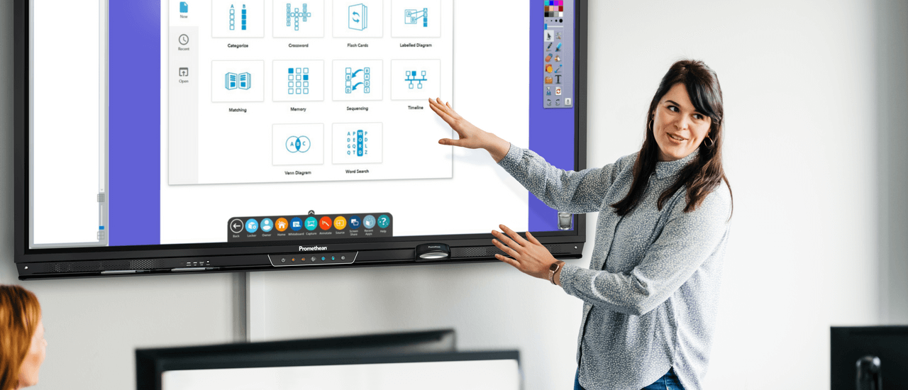 Woman demoing the ActivPanel capabilities