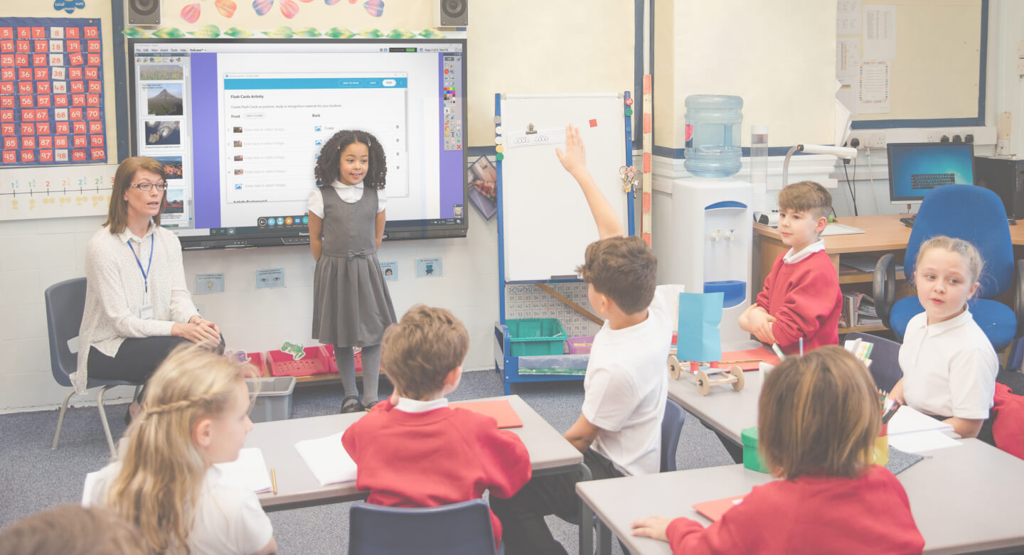 teacher and students using ActivPanel in the classroom