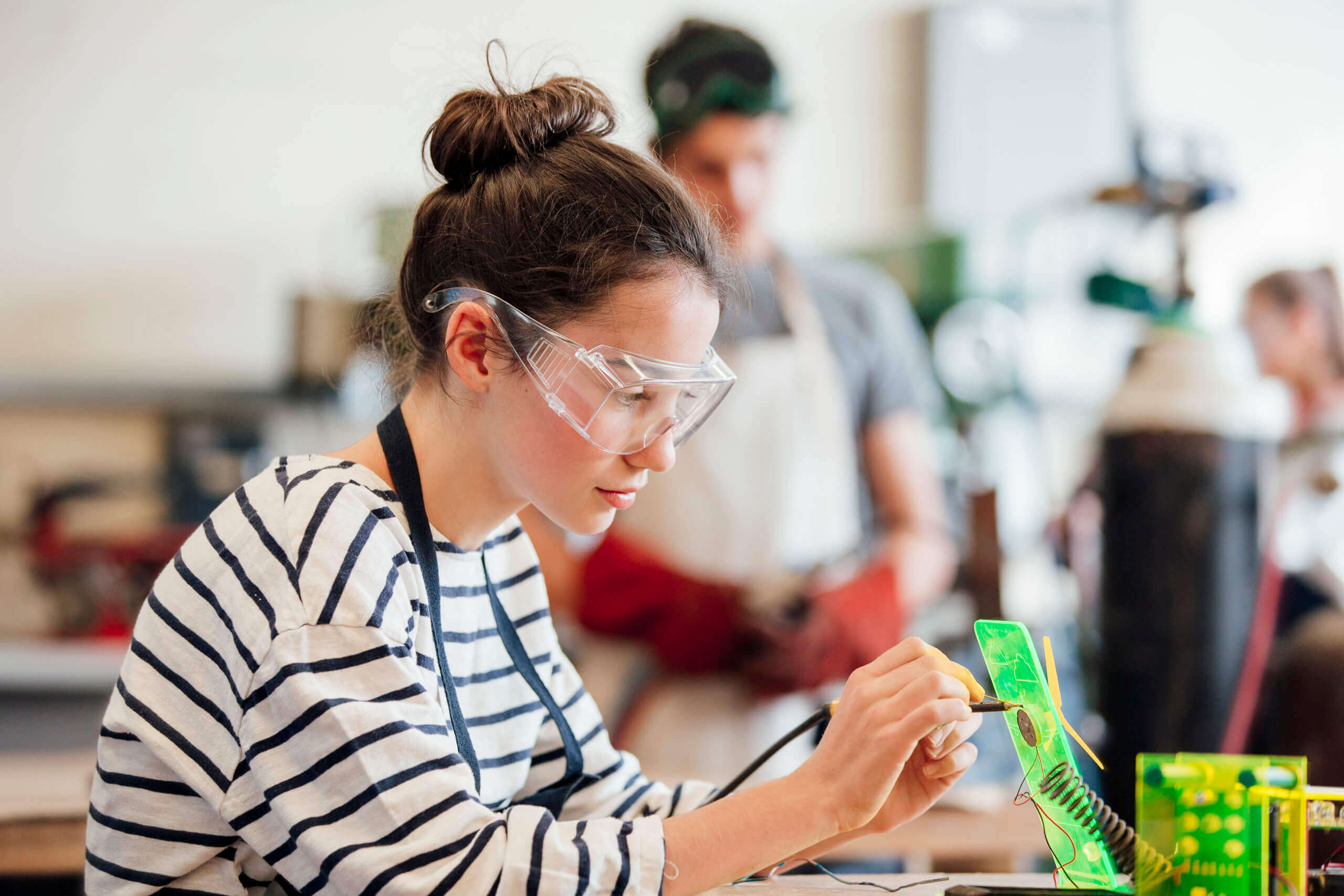 student engaging in science class