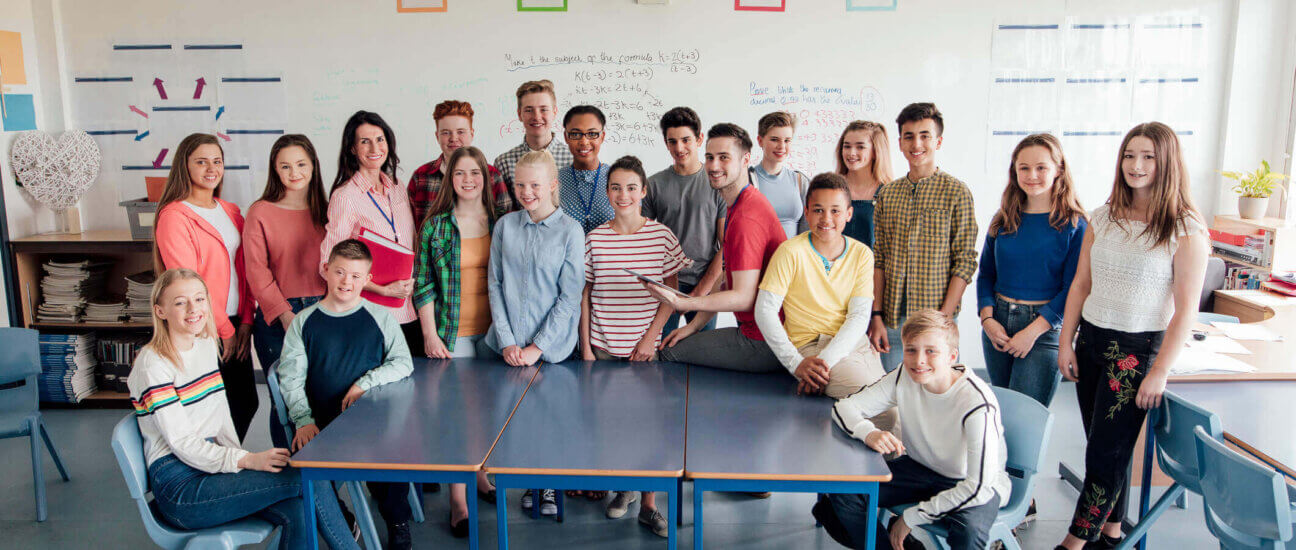 group of students in the classroom including neurodiverse students