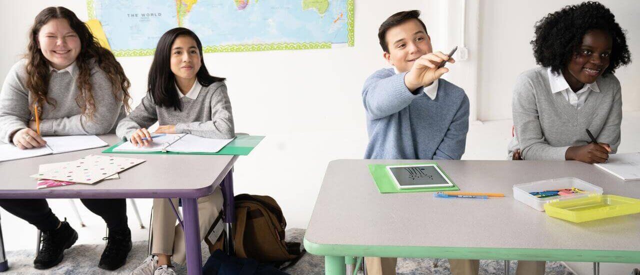 group of students using geography apps in the classroom