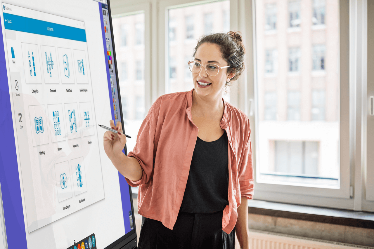 woman using Promethean Software on an ActivPanel
