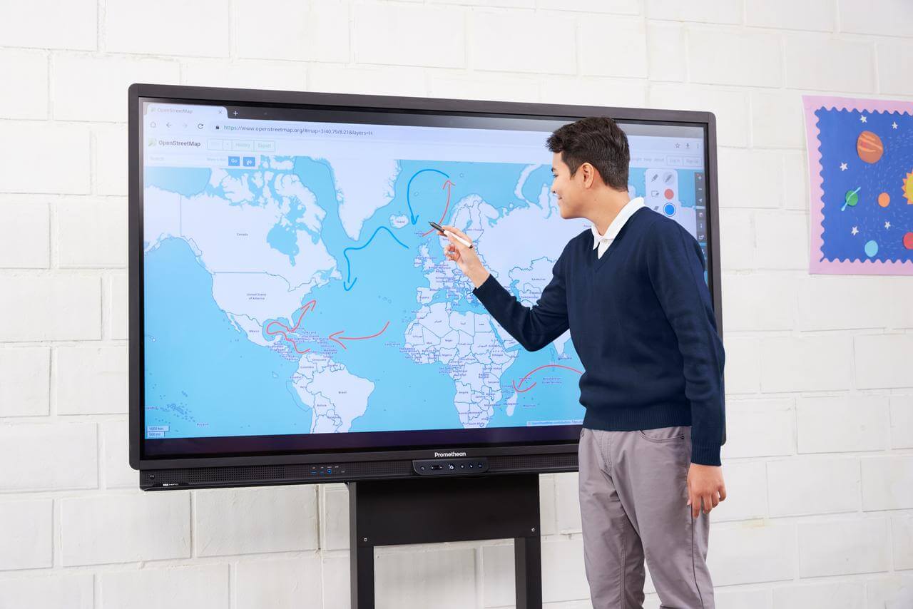 teacher using his activpanel on his activpanel stand