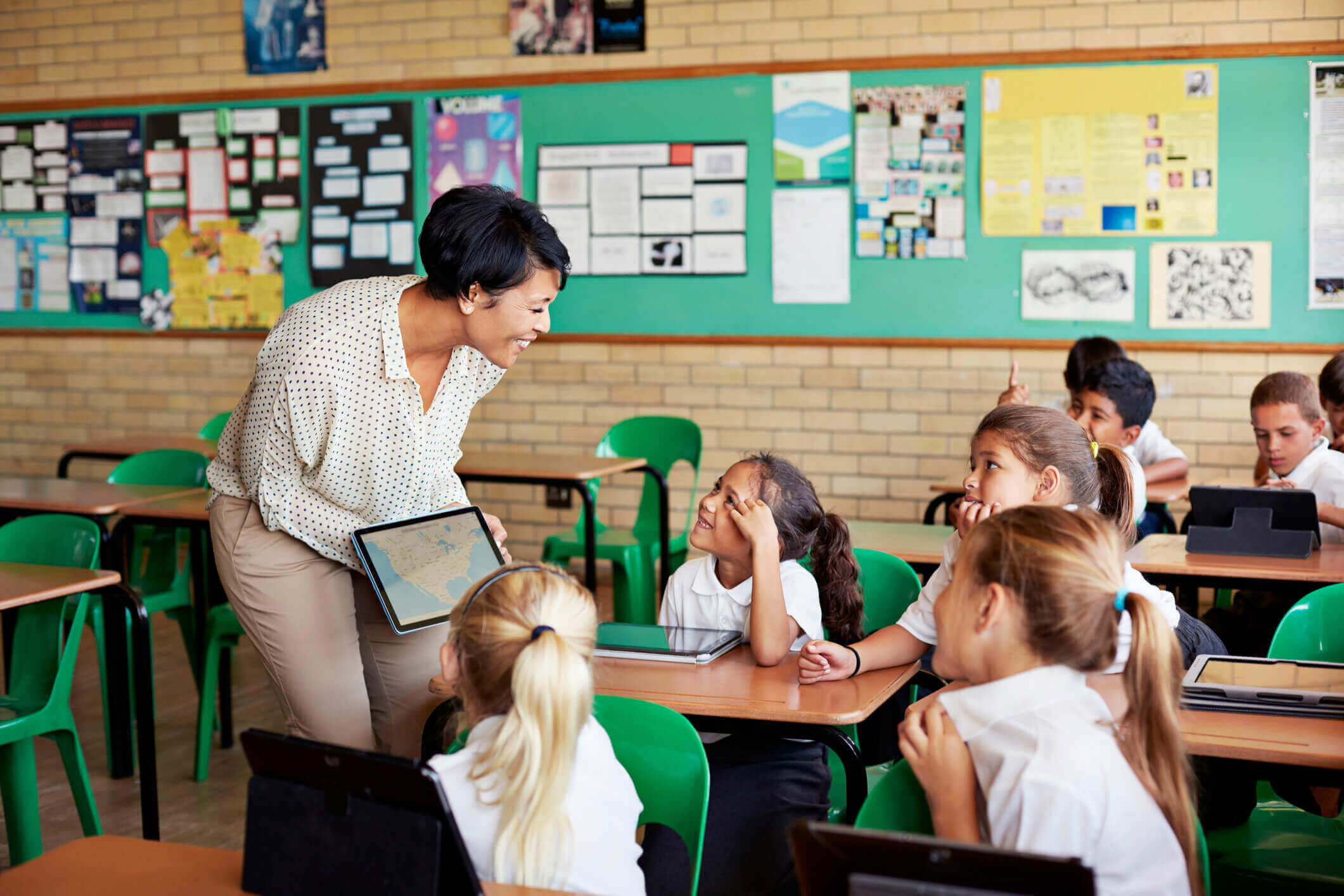 students engaged in the classroom learning environment