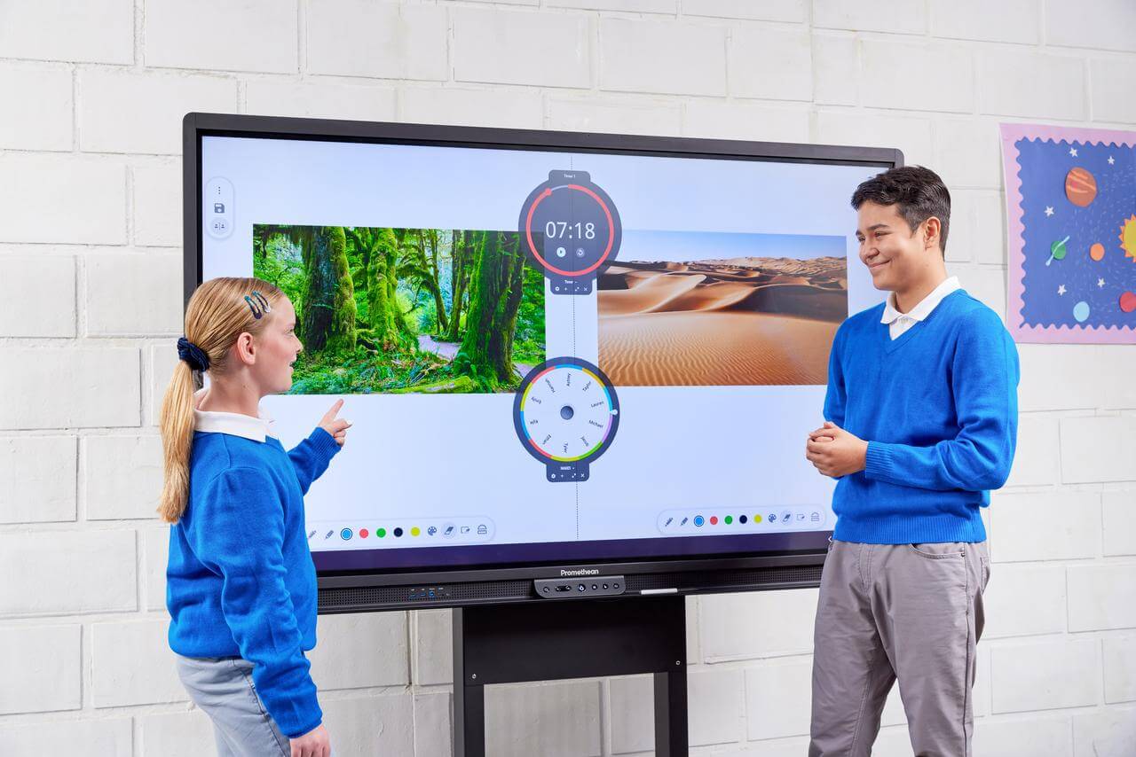 Children using a interactive display/ smart panel