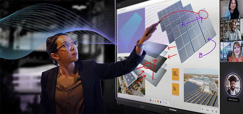 Business woman interacts with promethean ActivPanel