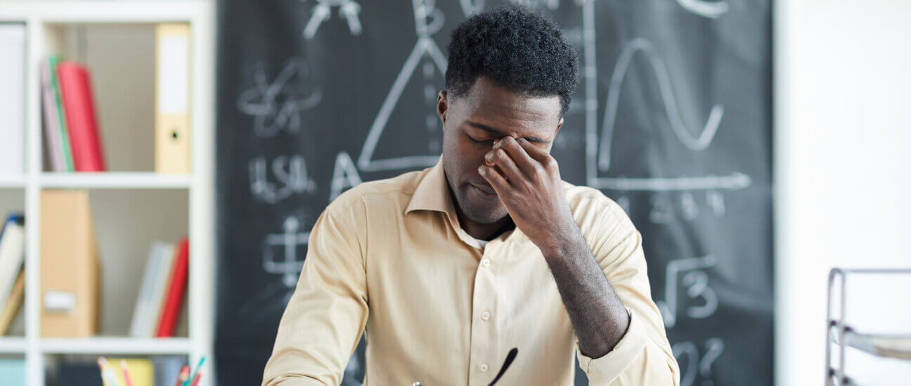 male educator experiencing technostress